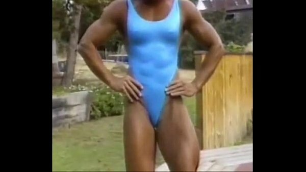 Blonde FBB in One Piece Swimsuit Scissors Knockout